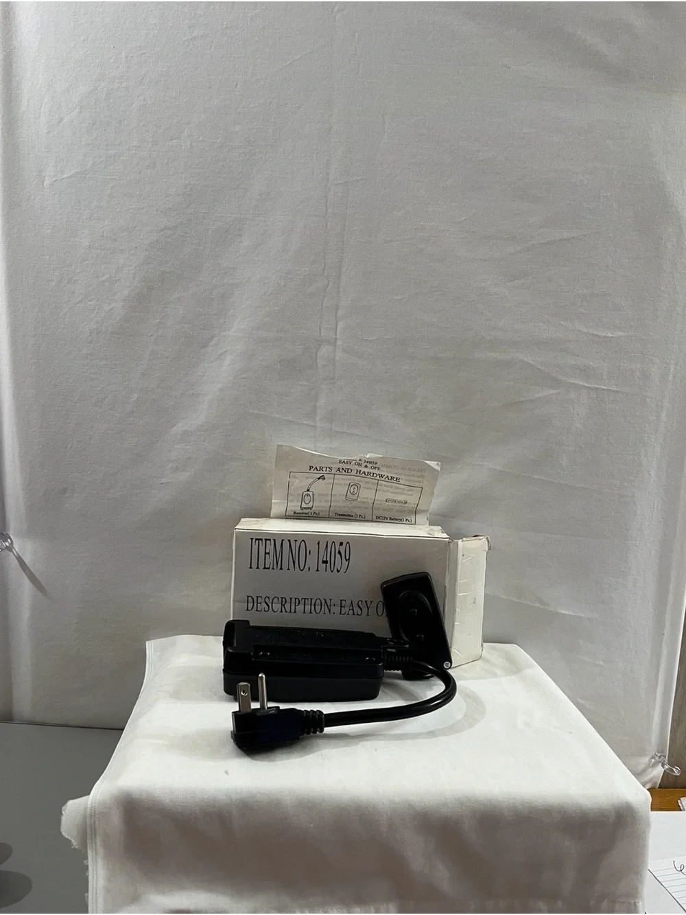 Black Remote and Power Adapter Set